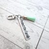 il_fullxfull.7581637868_hzaa-1 I Protect the Family Keychain • Stainless Steel Bar with Tassel