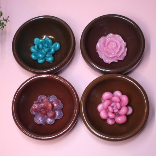 ✨ The perfect blend of natural beauty and handcrafted artistry! These handmade bamboo ring dishes bring warmth and elegance to your space, with a rich chocolate brown hand-painted finish and a stunning resin floral centerpiece. The bowls are upcycled and rescued from a local thrift store and lovingly re-finished and upgraded. Each 3.5-inch round bamboo bowl is sanded smooth and carefully hand-painted, creating a luxurious, earthy base for the delicate hand-cast resin flowers. Choose from four st