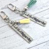 Fuck the Oligarchy Keychain with Tassel – Feminist Stainless Steel Statement Accessory