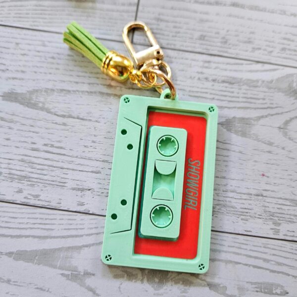 il_fullxfull.7581660744_hamc-2 Showgirl Era Cassette Keychain – Personalized Retro Mixtape Bag Charm with Tassel