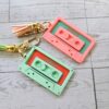 il_fullxfull.7581661176_nbwa-1 Showgirl Era Cassette Keychain – Personalized Retro Mixtape Bag Charm with Tassel