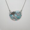 il_fullxfull.7581662570_5ybb-1 Handmade Concrete Pendant: Blue Iridescent Stone Inlay, Silver Chrome Accent
