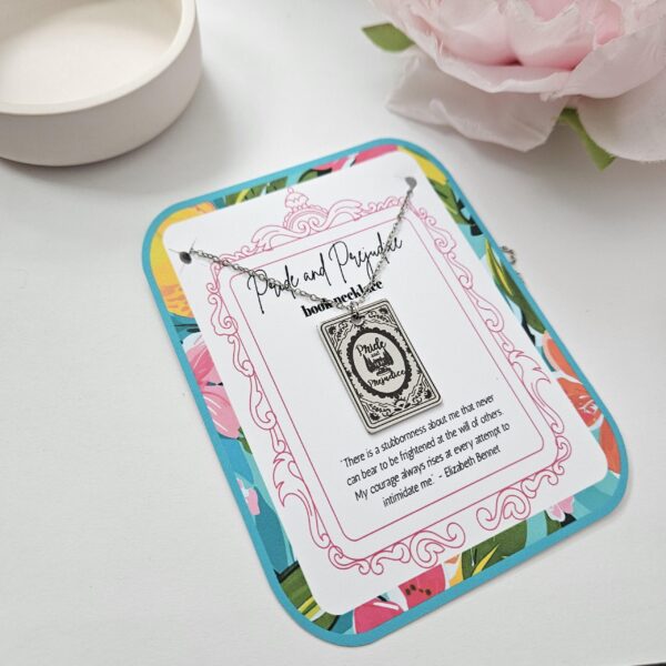 Pride and Prejudice Book Necklace – Jane Austen Literary Jewelry – Romantic Gift for Her 2 Miniature Pride and Prejudice book pendant — engraved stainless steel, mirror-polish finish. Jane Austen jewelry for the romantic reader. Tarnish-proof. "You have bewitched me, body and soul." 🥀📖 Whether you're a Lizzie or a Darcy, our Pride and Prejudice Book Necklace is the ultimate tribute to the world’s most famous enemies-to-lovers story. Crafted from high-grade 304 Stainless Steel and polished to a stunning mirror finish, this pendant is designed for the dreamers, the readers, and the ones (2)