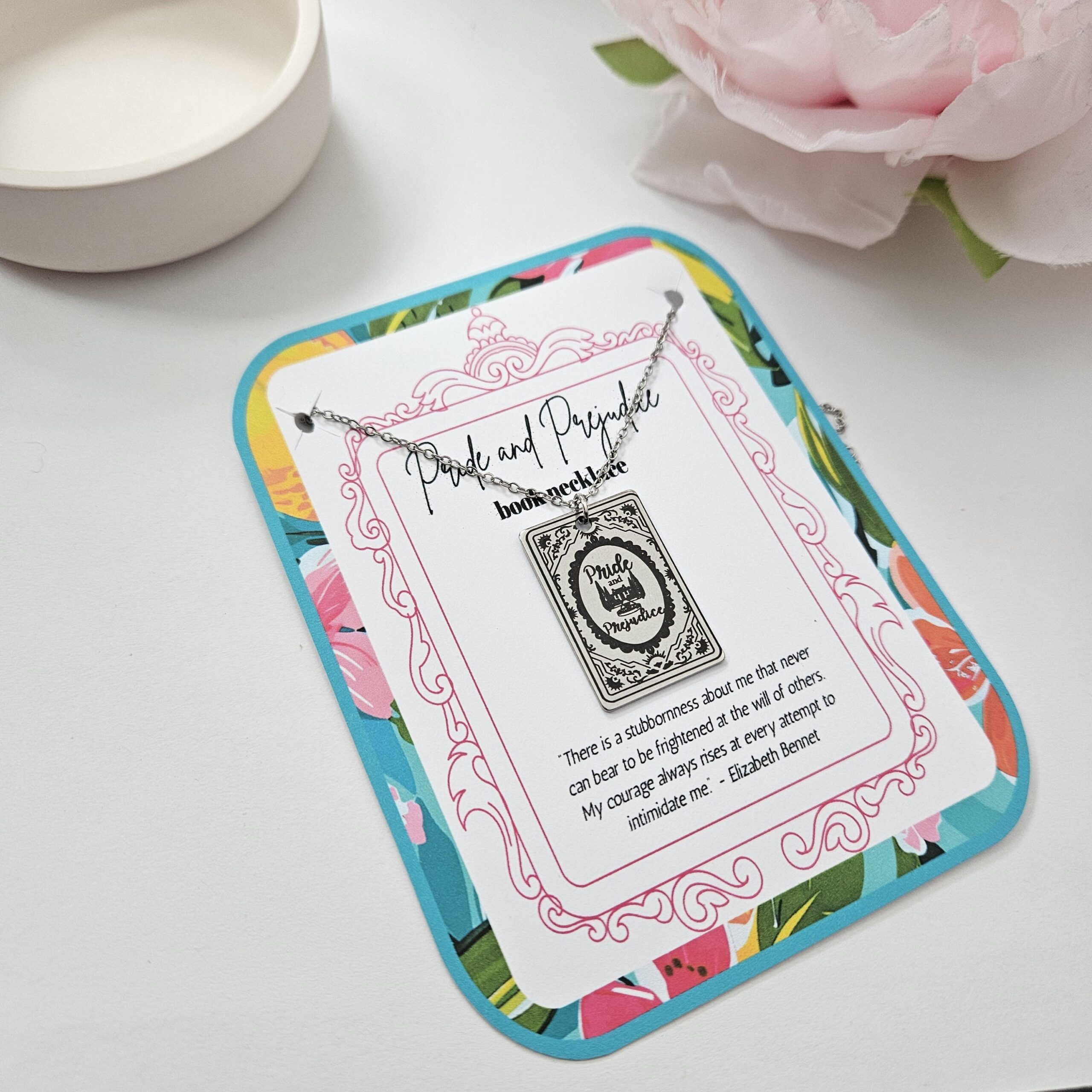 Miniature Pride and Prejudice book pendant — engraved stainless steel, mirror-polish finish. Jane Austen jewelry for the romantic reader. Tarnish-proof. "You have bewitched me, body and soul." 🥀📖 Whether you're a Lizzie or a Darcy, our Pride and Prejudice Book Necklace is the ultimate tribute to the world’s most famous enemies-to-lovers story. Crafted from high-grade 304 Stainless Steel and polished to a stunning mirror finish, this pendant is designed for the dreamers, the readers, and the ones (2)