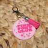 il_fullxfull.7581664736_roih Pink Pony Club Motel Keychain Round Keychain with Tassel