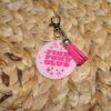 il_fullxfull.7581664934_l35w Pink Pony Club Motel Keychain Round Keychain with Tassel