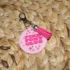 il_fullxfull.7581665082_lt29 Pink Pony Club Motel Keychain Round Keychain with Tassel