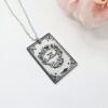 Engraved Peter and Wendy Book Necklace – Stainless Steel Literary Jewelry 4 Miniature Peter and Wendy book pendant, engraved in-house with original cover art. Mirror-polish stainless steel, tarnish-proof. A gift for every lost girl. “To live would be an awfully big adventure.” ✨🧚♂️ Fly away to Neverland with a piece of jewelry as unique as the story itself. Our Peter and Wendy Book Necklace features original cover art designed in our studio, making this a one-of-a-kind tribute you won't find anywhere else. Forget mass-produced charms. Each pendant is engraved in-house (4)