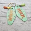 il_fullxfull.7581669120_bwdl-1 Rhinestone Showgirl Motel Keychain: Mint Green Glitter Resin Key Tag - Choose Style and Attachment