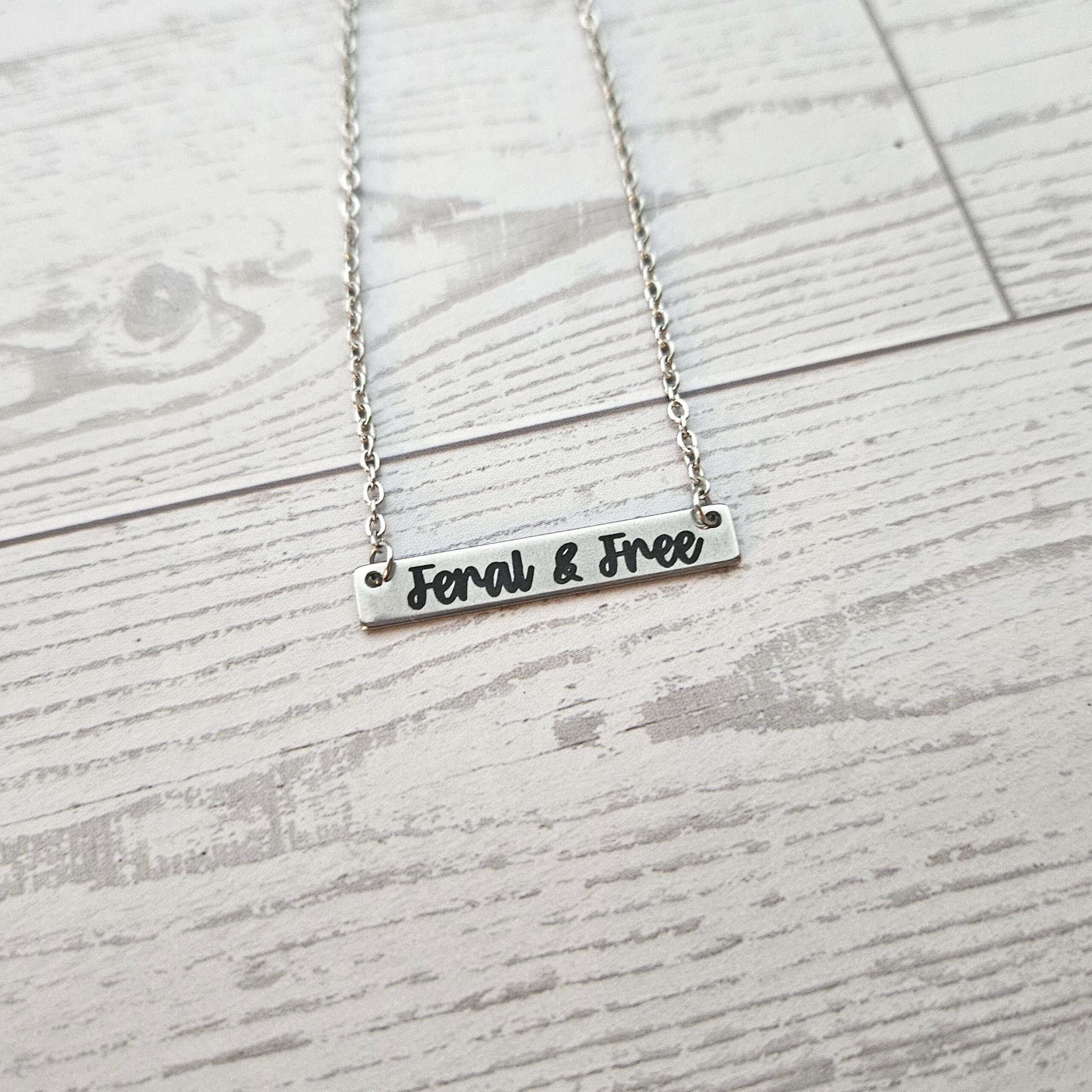 Feral and Free Necklace – Feminist Jewelry Gift – Stainless Steel Bar Pendant with Black Engraving - Image 3