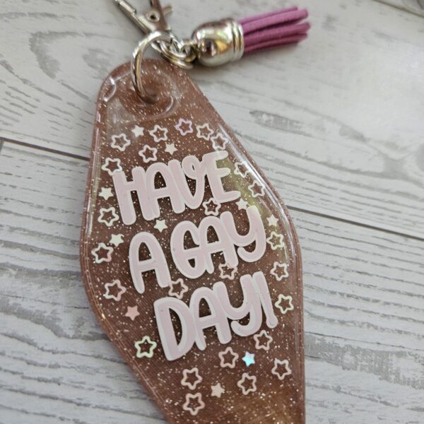 il_fullxfull.7581675840_elzz-1 Retro "Have a Gay Day" Keychain: 3D Printed Glitter Pride Key Fob