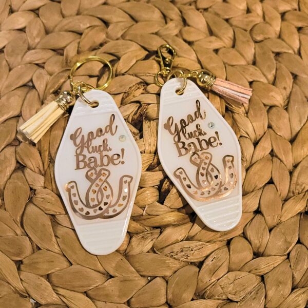 il_fullxfull.7581677096_m9b7-1 Good Luck Babe Keychain: Chic White Gold Design - Cream Tassel