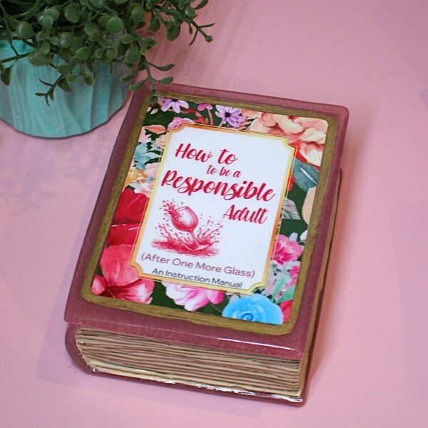 Funny Resin Book Box: 'How to be a Responsible Adult' - Handmade Storage for Book Lovers 2 Because responsibility can wait until the next pour. 🍷📖 Meet your new favorite secret stash spot—a stunning jelly rose red resin book box that’s equal parts classy and cheeky. Whether it’s perched on your bookshelf, desk, or bar cart, this handmade epoxy resin box is designed for those who appreciate a touch of luxury with their humor. Makes the perfect gift for you booktok bestie or yourself! ✨ Features: 📖 Crafted from high-quality tinted epoxy resin – with a translucent jelly rose red finish t (2)