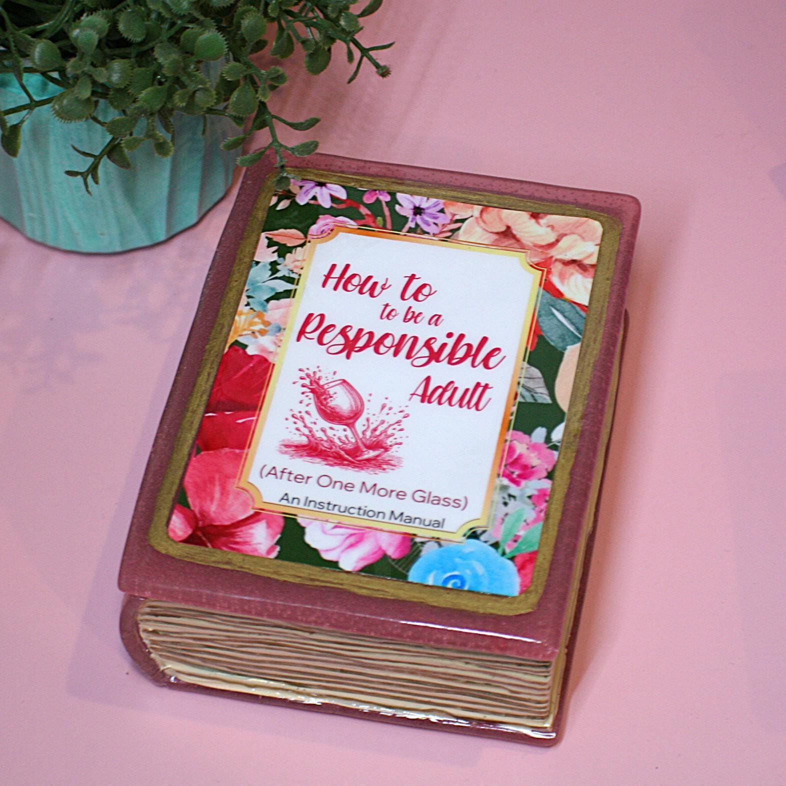 Because responsibility can wait until the next pour. 🍷📖 Meet your new favorite secret stash spot—a stunning jelly rose red resin book box that’s equal parts classy and cheeky. Whether it’s perched on your bookshelf, desk, or bar cart, this handmade epoxy resin box is designed for those who appreciate a touch of luxury with their humor. Makes the perfect gift for you booktok bestie or yourself! ✨ Features: 📖 Crafted from high-quality tinted epoxy resin – with a translucent jelly rose red finish t (2)