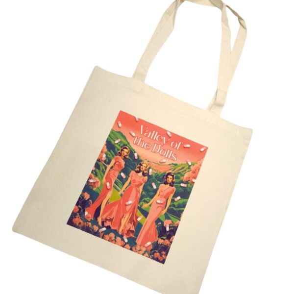 The ultimate stylish gift for the bookworm or vintage cinema lover in your life! 🌸🎬 Step into the glam world of Valley of the Dolls with our stunning tote bag, featuring original pink and green artwork inspired by the iconic novel and film. This stylish, heavy-duty canvas tote is perfect for everyday use and durable enough for whatever life throws your way. The original design is sublimated directly onto the canvas, ensuring long-lasting beauty. Whether you're a fan of retro chic or looking for (5)