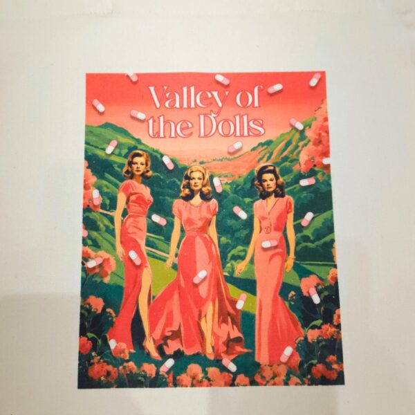 The ultimate stylish gift for the bookworm or vintage cinema lover in your life! 🌸🎬 Step into the glam world of Valley of the Dolls with our stunning tote bag, featuring original pink and green artwork inspired by the iconic novel and film. This stylish, heavy-duty canvas tote is perfect for everyday use and durable enough for whatever life throws your way. The original design is sublimated directly onto the canvas, ensuring long-lasting beauty. Whether you're a fan of retro chic or looking for (8)