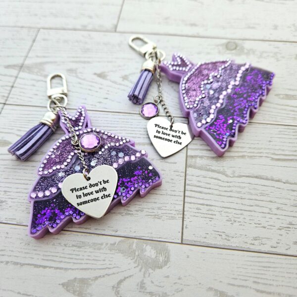il_fullxfull.7606331578_7cvb-1 This night is sparkling Eras Dress Glow in the Dark Bag Charm