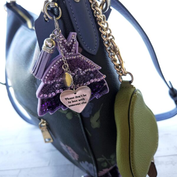 il_fullxfull.7606340304_6633-1 This night is sparkling Eras Dress Glow in the Dark Bag Charm