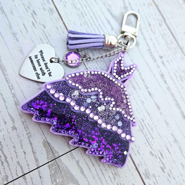 il_fullxfull.7606345732_1i15 This night is sparkling Eras Dress Glow in the Dark Bag Charm