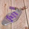 il_fullxfull.7629583259_ahk5 Protest Motel Keychain - Bitch, We’re Still Fighting Keychain