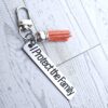 il_fullxfull.7629585541_evyd-2 I Protect the Family Keychain • Stainless Steel Bar with Tassel