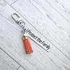 il_fullxfull.7629585841_5z23-1 I Protect the Family Keychain • Stainless Steel Bar with Tassel
