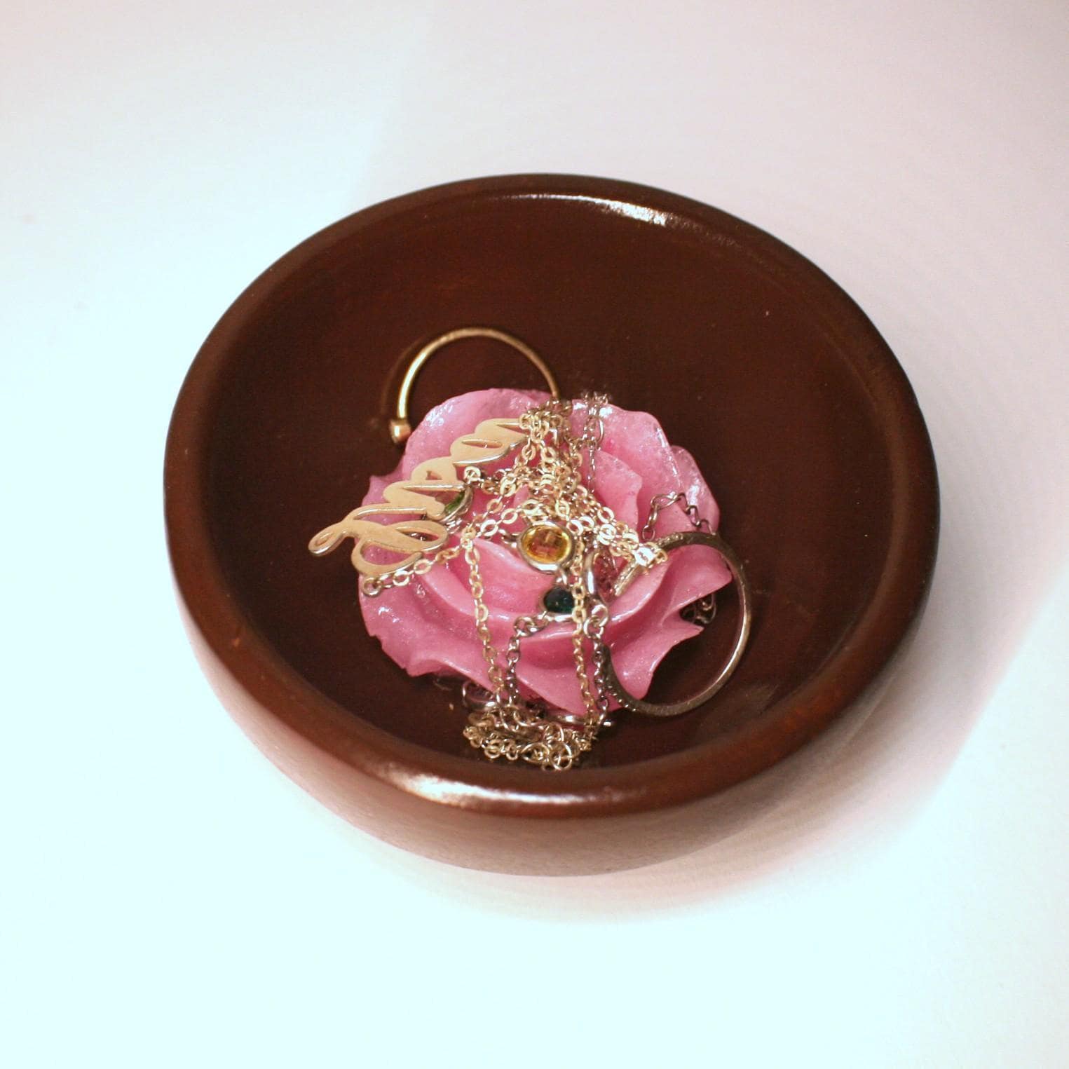 ✨ The perfect blend of natural beauty and handcrafted artistry! These handmade bamboo ring dishes bring warmth and elegance to your space, with a rich chocolate brown hand-painted finish and a stunning resin floral centerpiece. The bowls are upcycled and rescued from a local thrift store and lovingly re-finished and upgraded. Each 3.5-inch round bamboo bowl is sanded smooth and carefully hand-painted, creating a luxurious, earthy base for the delicate hand-cast resin flowers. Choose from four st (3)