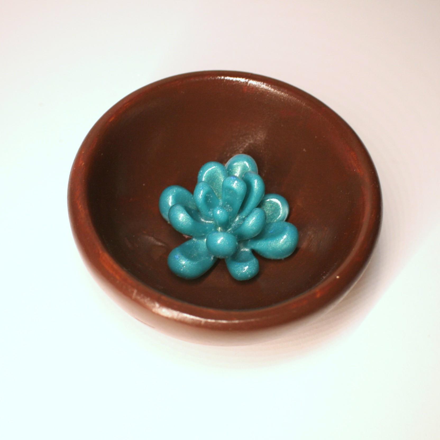 ✨ The perfect blend of natural beauty and handcrafted artistry! These handmade bamboo ring dishes bring warmth and elegance to your space, with a rich chocolate brown hand-painted finish and a stunning resin floral centerpiece. The bowls are upcycled and rescued from a local thrift store and lovingly re-finished and upgraded. Each 3.5-inch round bamboo bowl is sanded smooth and carefully hand-painted, creating a luxurious, earthy base for the delicate hand-cast resin flowers. Choose from four st (8)
