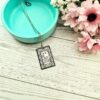 Gatsby Book Necklace – Mirror Polish Stainless Steel Literary Pendant 4 Great Gatsby miniature book pendant — mirror-polish stainless steel, engraved in-house. Tarnish-proof literary jewelry for the classic literature lover. “So we beat on, boats against the current...” 🍸✨ Capture the glittering allure of West Egg with our Mirror Polish Great Gatsby Necklace. This isn't just a book charm; it’s a high-shine statement piece designed for those who find beauty in the classics. Crafted from 304 Stainless Steel and polished to a brilliant, reflective finish, it mimics the (4)