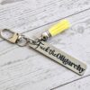 Fuck the Oligarchy Keychain with Tassel – Feminist Stainless Steel Statement Accessory