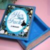Handmade Resin Book Box: "Her Final Fuck... A Memoir" - Blue Floral Keepsake Storage 1 Some books hold stories—this one holds secrets. 💙✨ Introducing the handmade resin book box in a striking bright blue hue, designed for book lovers who appreciate a little edge with their elegance. Crafted with tinted epoxy resin, this durable and stylish storage box blends effortlessly into your bookshelf, making it the perfect spot to stash your small treasures. ✨ Features: 📖 Expertly crafted from high-quality epoxy resin – glossy, sturdy, and built to last. The boxes can stand a drop but will (1)