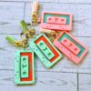 il_fullxfull.7629608527_ojdv Showgirl Era Cassette Keychain – Personalized Retro Mixtape Bag Charm with Tassel