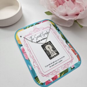 Secret Garden miniature book pendant — mirror-polish stainless steel, engraved in-house. Cottagecore literary gift for the book lover, gardener, or dreamer. “If you look the right way, you can see that the whole world is a garden.” 🌿🗝️ Unlock a bit of magic with our Secret Garden Book Necklace. A tribute to Frances Hodgson Burnett’s beloved tale of hidden beauty and second chances, this pendant is designed for the dreamers who believe in the power of growth. Whether you’re a lifelong reader or a (1)