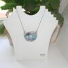 il_fullxfull.7629610327_23k8 Handmade Concrete Pendant: Blue Iridescent Stone Inlay, Silver Chrome Accent