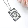 Engraved Peter and Wendy Book Necklace – Stainless Steel Literary Jewelry 1 Miniature Peter and Wendy book pendant, engraved in-house with original cover art. Mirror-polish stainless steel, tarnish-proof. A gift for every lost girl. “To live would be an awfully big adventure.” ✨🧚♂️ Fly away to Neverland with a piece of jewelry as unique as the story itself. Our Peter and Wendy Book Necklace features original cover art designed in our studio, making this a one-of-a-kind tribute you won't find anywhere else. Forget mass-produced charms. Each pendant is engraved in-house (1)