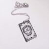 Engraved Peter and Wendy Book Necklace – Stainless Steel Literary Jewelry 6 Miniature Peter and Wendy book pendant, engraved in-house with original cover art. Mirror-polish stainless steel, tarnish-proof. A gift for every lost girl. “To live would be an awfully big adventure.” ✨🧚♂️ Fly away to Neverland with a piece of jewelry as unique as the story itself. Our Peter and Wendy Book Necklace features original cover art designed in our studio, making this a one-of-a-kind tribute you won't find anywhere else. Forget mass-produced charms. Each pendant is engraved in-house (6)