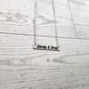 Feral and Free Necklace – Feminist Jewelry Gift – Stainless Steel Bar Pendant with Black Engraving