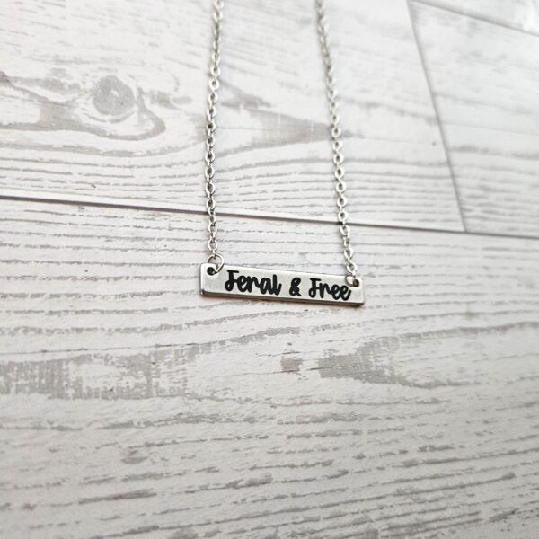 Feral and Free Necklace – Feminist Jewelry Gift – Stainless Steel Bar Pendant with Black Engraving
