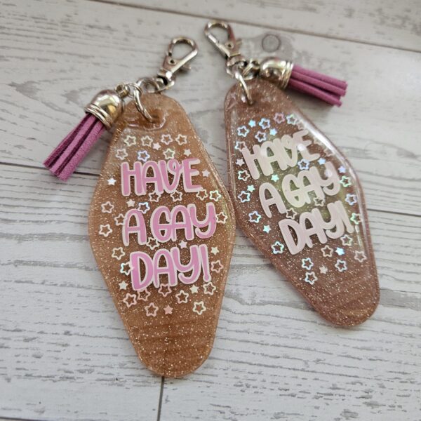 il_fullxfull.7629622829_9j58 Retro "Have a Gay Day" Keychain: 3D Printed Glitter Pride Key Fob