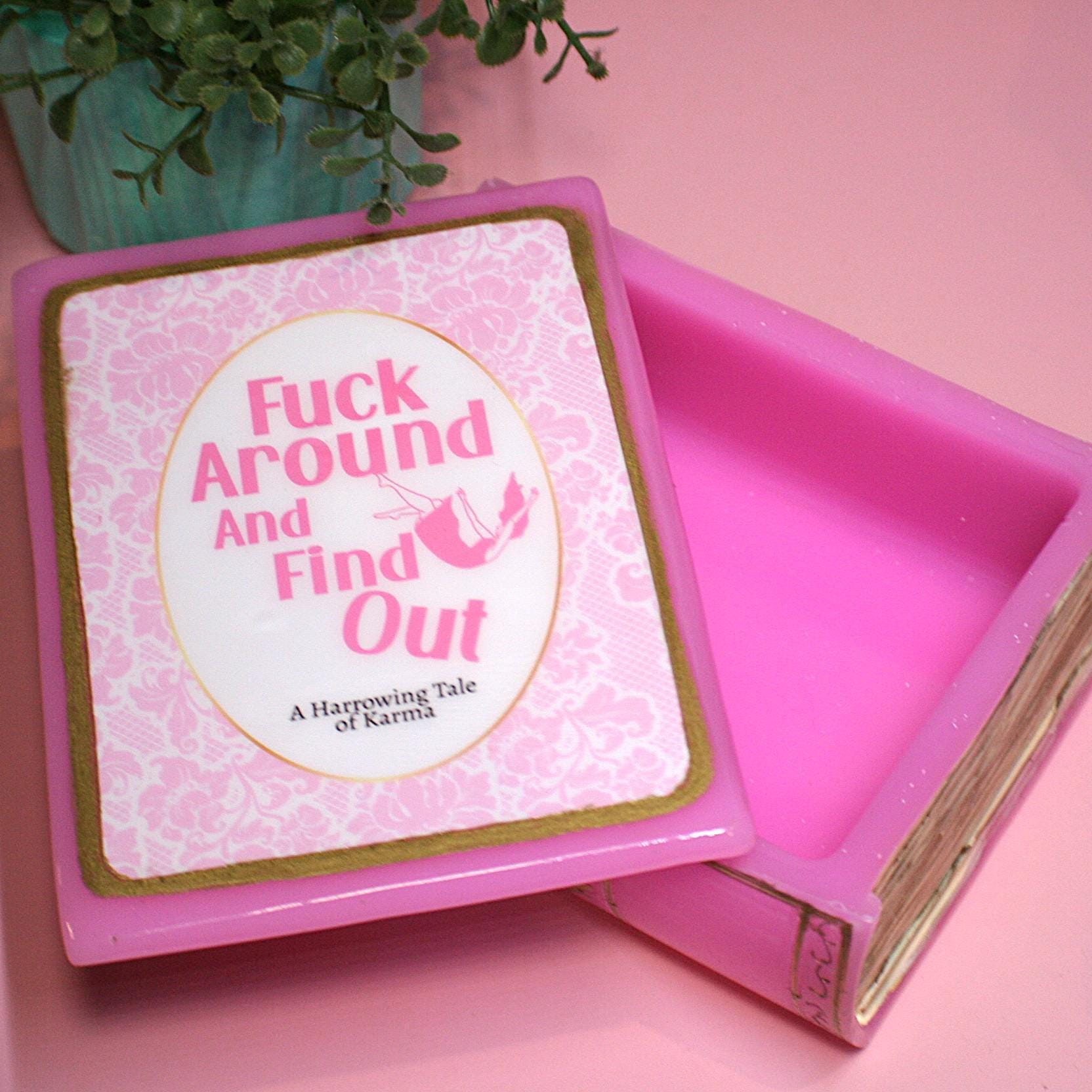 Hide your treasures in plain sight with this handmade resin book box—a sassy and stylish storage solution for any book lover! Designed to blend seamlessly into your bookshelf or desk, this epoxy resin book box is both functional and eye-catching. ✨ Features: 📖 Handcrafted with high-quality tinted epoxy resin – durable, glossy, and built to last. 🎨 Hand-painted page details – complete with gold accents on the edges and spine for that luxury book aesthetic. 💖 Custom-designed cover – featuring a pi (6)