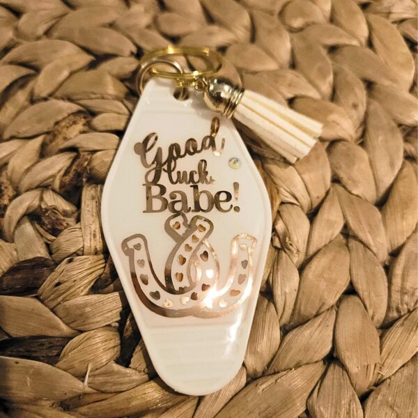 il_fullxfull.7629624587_de3p Good Luck Babe Keychain: Chic White Gold Design - Cream Tassel