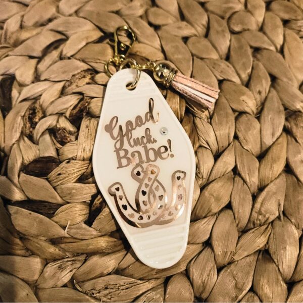il_fullxfull.7629624643_t223 Good Luck Babe Keychain: Chic White Gold Design - Cream Tassel