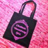 Jane Austen Tote Bag - Obstinate Headstrong Girl Canvas Book Bag 5 The ultimate gift for the witty bookworm! 📚 This bold Jane Austen tote bag features the "Obstinate Headstrong Girl" quote. Perfect for library hauls and gifts. Obsessed with Jane Austen but tired of boring, beige book bags? We’ve got you. This She’sSoCrafty Goods original design takes the wit of Pride and Prejudice and gives it a bold, modern glow-up. 💖✨ Crafted from premium, heavyweight black cotton canvas, this 14" x 15" tote is sturdy enough to carry your entire TBR (To-Be-Read) pile, your la (5)