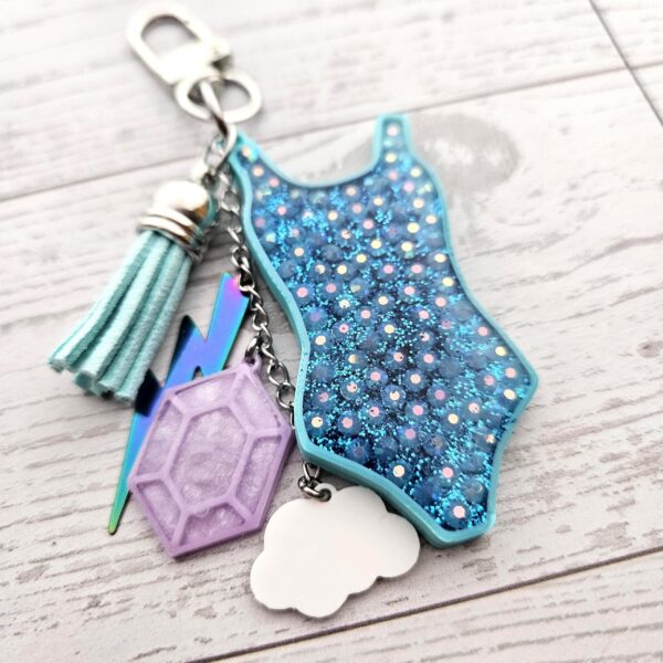 il_fullxfull.7732042587_3w75-1 Opalite Era Showgirl Bag Charm • Custom Lyric Engraved Heart or Glow-in-the-Dark Lightning Bolt