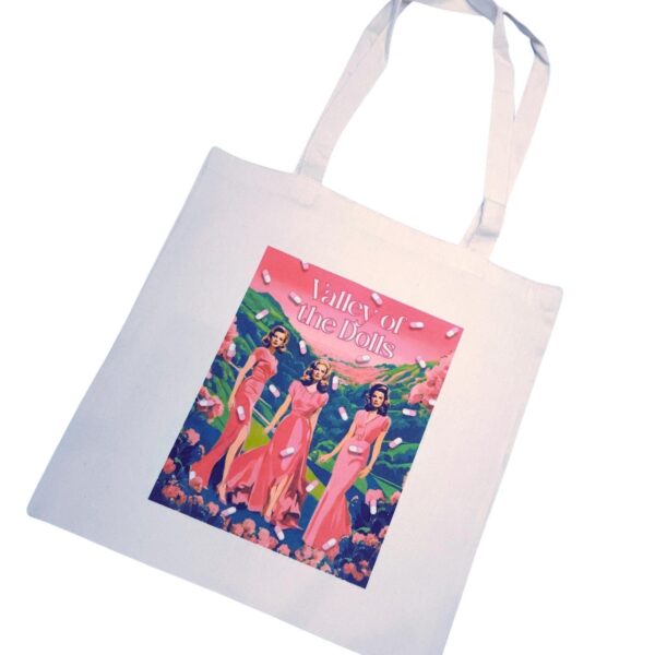The ultimate stylish gift for the bookworm or vintage cinema lover in your life! 🌸🎬 Step into the glam world of Valley of the Dolls with our stunning tote bag, featuring original pink and green artwork inspired by the iconic novel and film. This stylish, heavy-duty canvas tote is perfect for everyday use and durable enough for whatever life throws your way. The original design is sublimated directly onto the canvas, ensuring long-lasting beauty. Whether you're a fan of retro chic or looking for (1)
