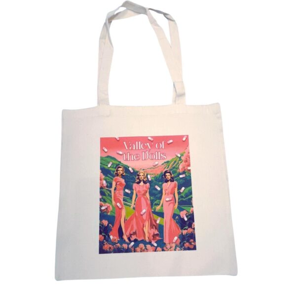 The ultimate stylish gift for the bookworm or vintage cinema lover in your life! 🌸🎬 Step into the glam world of Valley of the Dolls with our stunning tote bag, featuring original pink and green artwork inspired by the iconic novel and film. This stylish, heavy-duty canvas tote is perfect for everyday use and durable enough for whatever life throws your way. The original design is sublimated directly onto the canvas, ensuring long-lasting beauty. Whether you're a fan of retro chic or looking for (3)