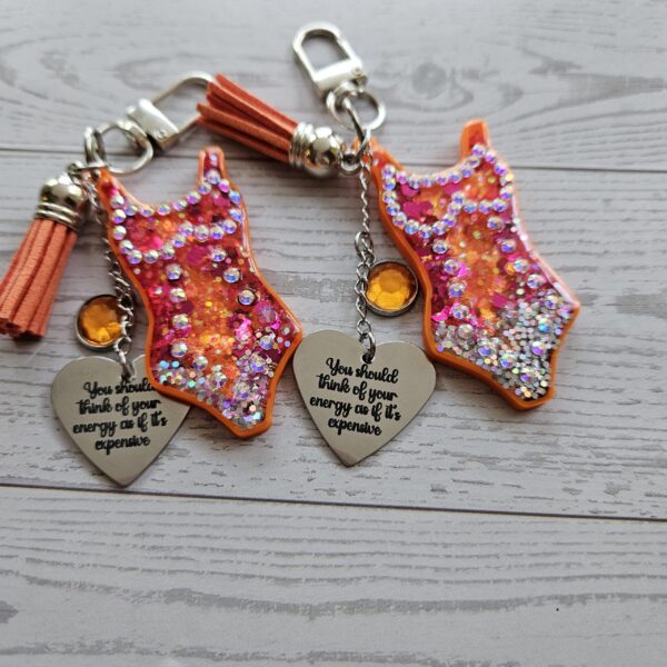 il_fullxfull.7853682808_ds3z-2 Orange Showgirl Era Keychain – Rhinestone Resin Bag Charm with Engraved Quote