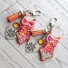 il_fullxfull.7853699924_2rmt Orange Showgirl Era Keychain – Rhinestone Resin Bag Charm with Engraved Quote