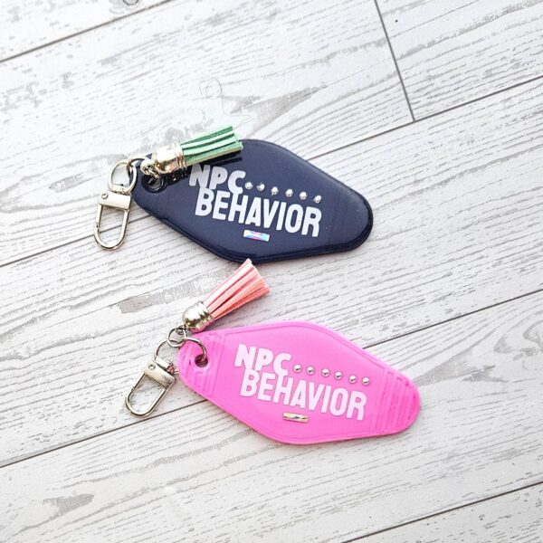 il_fullxfull.7857222702_d6l7-1 NPC Behavior Resin Motel Keychain, Funny Meme Bag Charm, Sarcastic Gift for Her
