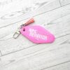 il_fullxfull.7857223612_6mq8-1 NPC Behavior Resin Motel Keychain, Funny Meme Bag Charm, Sarcastic Gift for Her